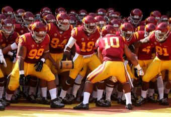 hi-res-185968581-the-usc-trojans-get-ready-to-run-out-of-the-tunnel-for_crop_north.jpg