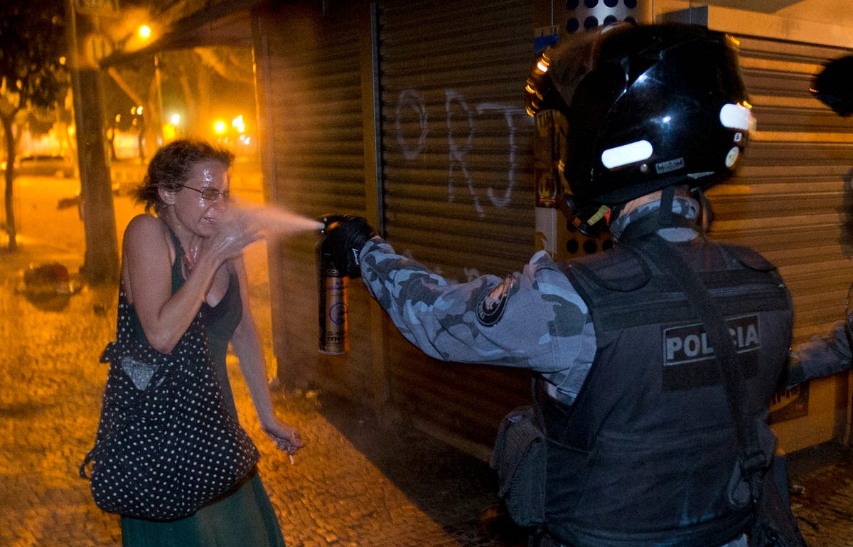 a-woman-getting-pepper-sprayed-in-rio.jpg