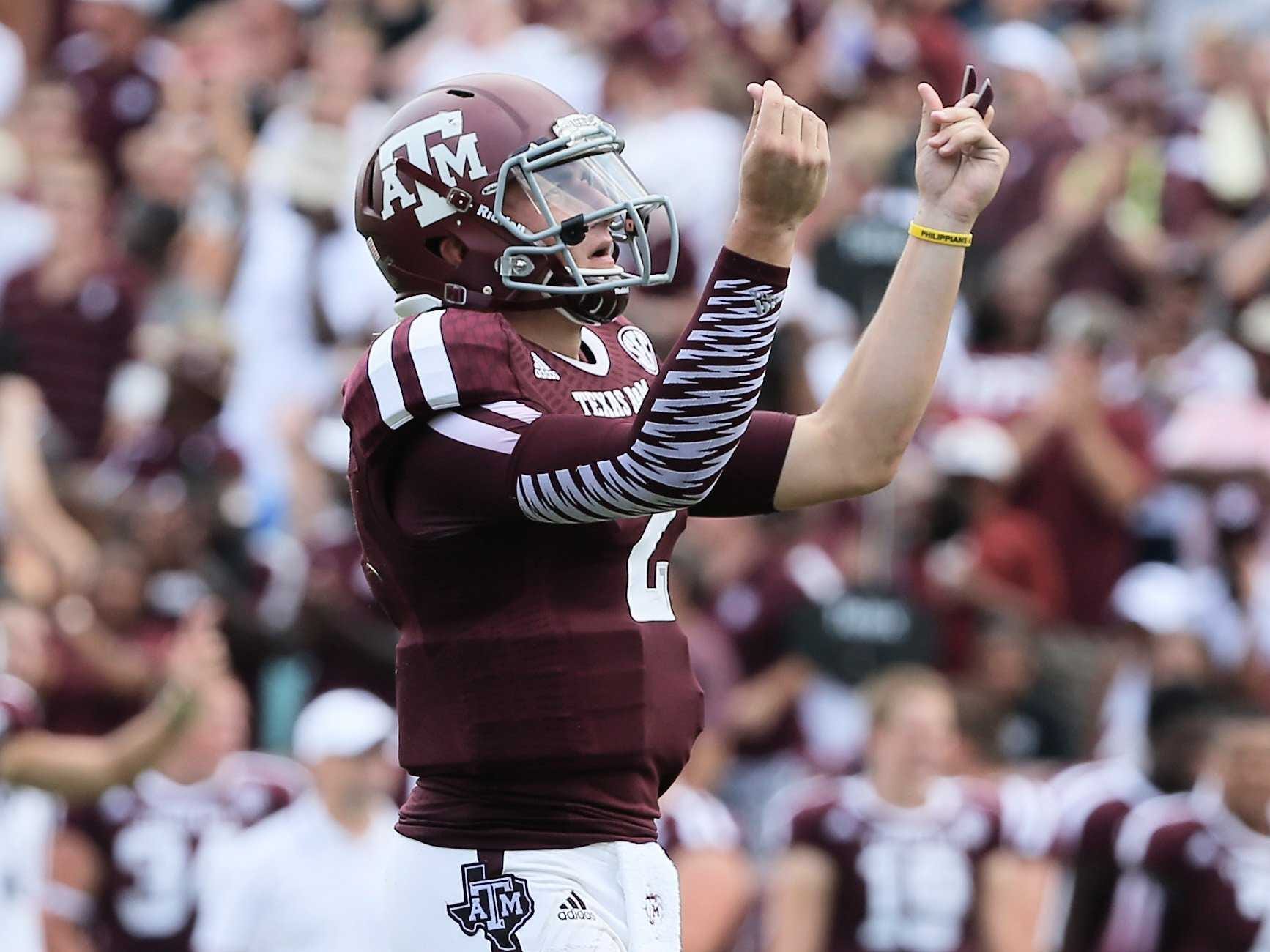 johnny-manziel-threw-his-first-touchdown-pass-and-then-did-the-show-me-the-money-celebration.jpg