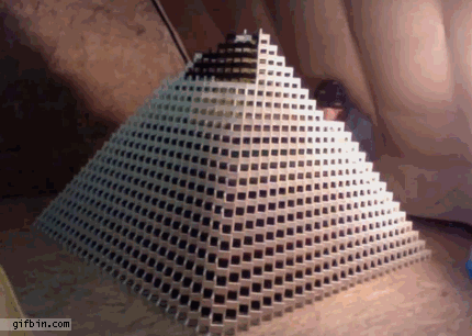 1332955794_big_domino_pyramid_collapses.gif
