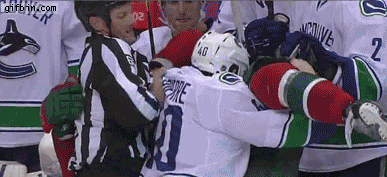 hockey-referee-punched-in-face.gif