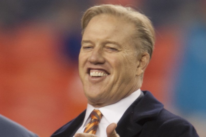 John-Elway-signs-three-year-extension-with-Broncos.jpg