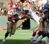 san-francisco-49ers-runningback-lawrence-phillips-gets-a-handoff-from-picture-id51617609.jpg