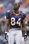 tight-end-shannon-sharpe-of-the-denver-broncos-walks-on-the-field-picture-id1360072.jpg