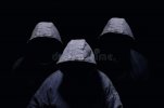 three-mysterious-men-silhouette-darkened-face-no-visible-blue-hoodies-dark-background-136681942.jpg