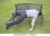 stock-photo-asleep-or-drunk-young-man-outdoors-on-a-park-bench-277096733.jpg