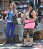 girl in blue leggings and socks anotehr girl in lace leggings pink dress two ugly girls new york.JPG