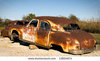 stock-photo-rusty-old-car-on-blocks-13604974.jpg
