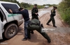 101221217-border-patrol-agent-searches-an-undocumented-gettyimages.jpg