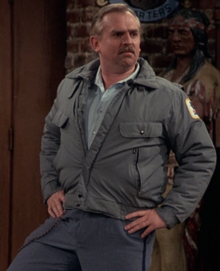 220px-Cliff_Clavin_posing_in_%22Please_Mr_Postman%22.png