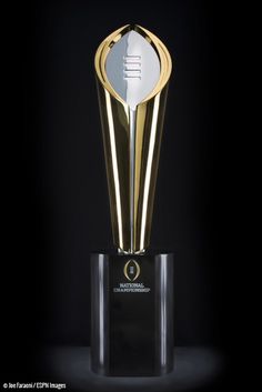 7dd6eacb5d84f770cb48e2b51f16b11f--football-trophies-college-football-playoff.jpg