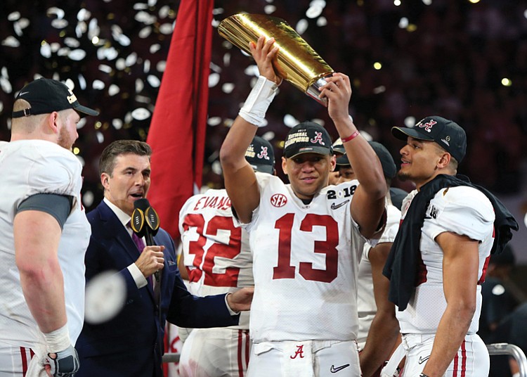 Tua_accepting_trophy_t750x550.jpg