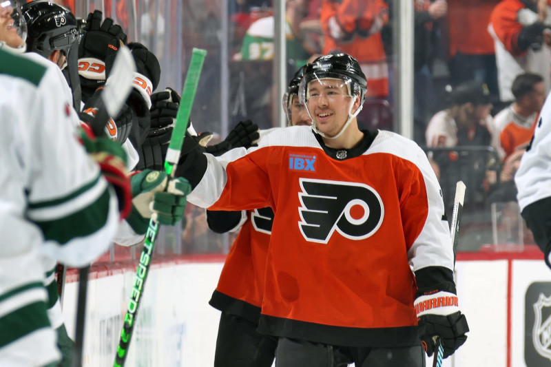 PHILADELPHIA, PENNSYLVANIA - OCTOBER 26:  Bobby Brink #10 of the Philadelphia Flyers celebrates Sean Couturier #14 (not pictured) second period goal with teammates against the Minnesota Wild at the Wells Fargo Center on October 26, 2023 in Philadelphia, Pennsylvania.  (Photo by Len Redkoles/NHLI via Getty Images)