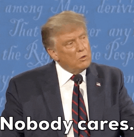 Political gif. Donald Trump coldly shakes his head as he speaks to right of frame. Text, Nobody cares.