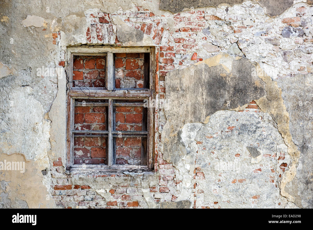 closed-blocked-window-and-old-stone-wall-background-EAD298.jpg