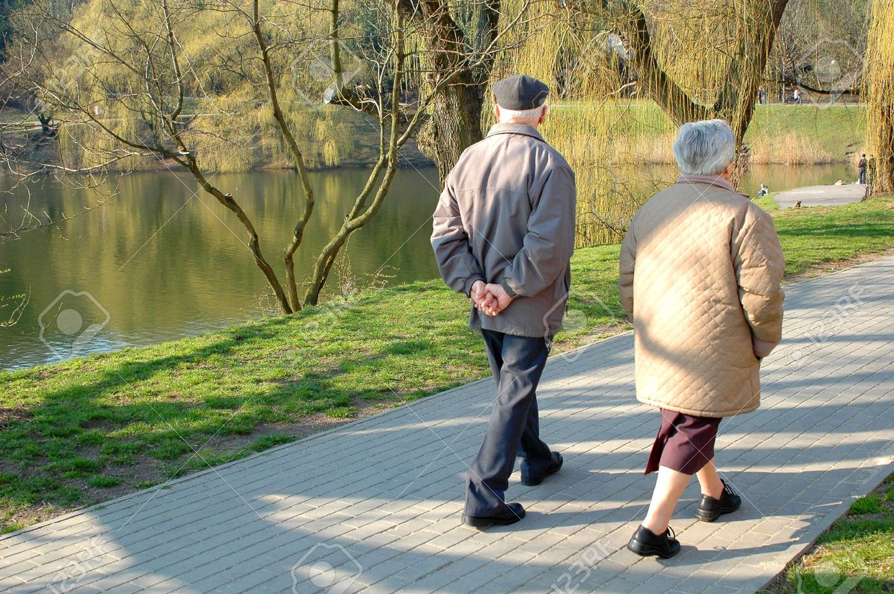 835375-A-couple-of-seniors-walking-in-the-park-metaphors-Stock-Photo-walk.jpg