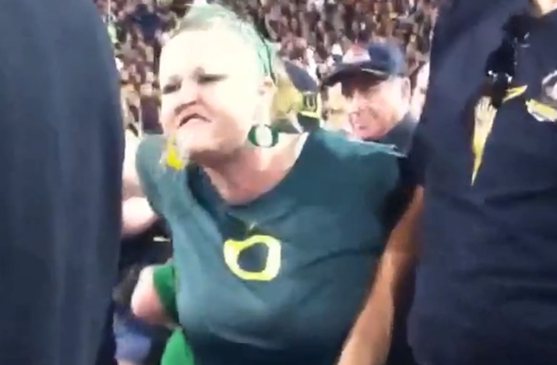 oregon-ducks-fan-fight-beer-shower-arizona-state.jpg