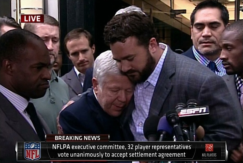 Jeff-Saturday-hugs-Robert-Kraft1.jpg