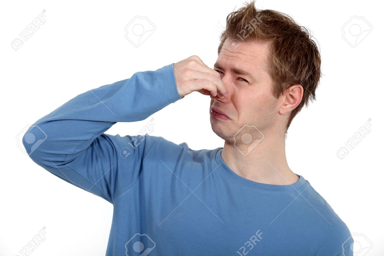 16471996-man-holding-his-nose-against-a-bad-smell.jpg