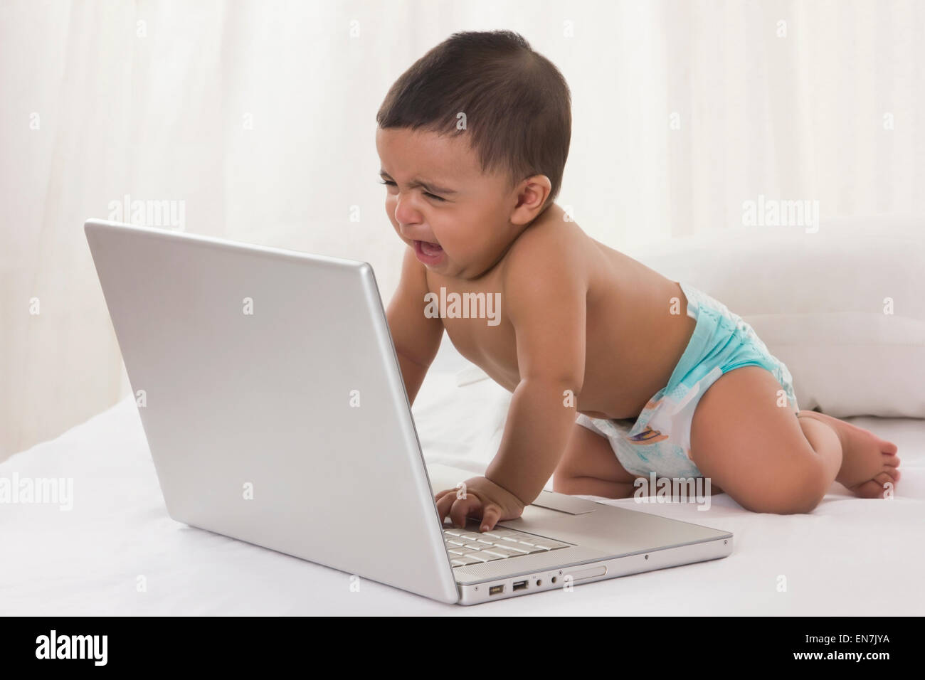 baby-with-laptop-crying-EN7JYA.jpg