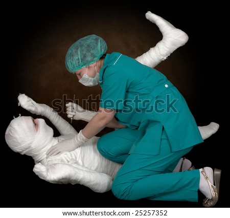 stock-photo-doctor-to-give-an-injection-on-bandaged-patient-25257352.jpg