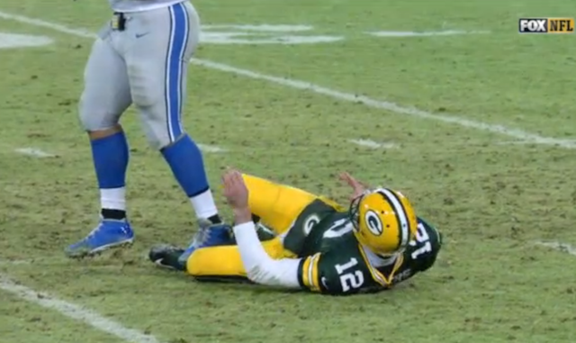 Rodgers-Suh-ankle-lions-packers.png