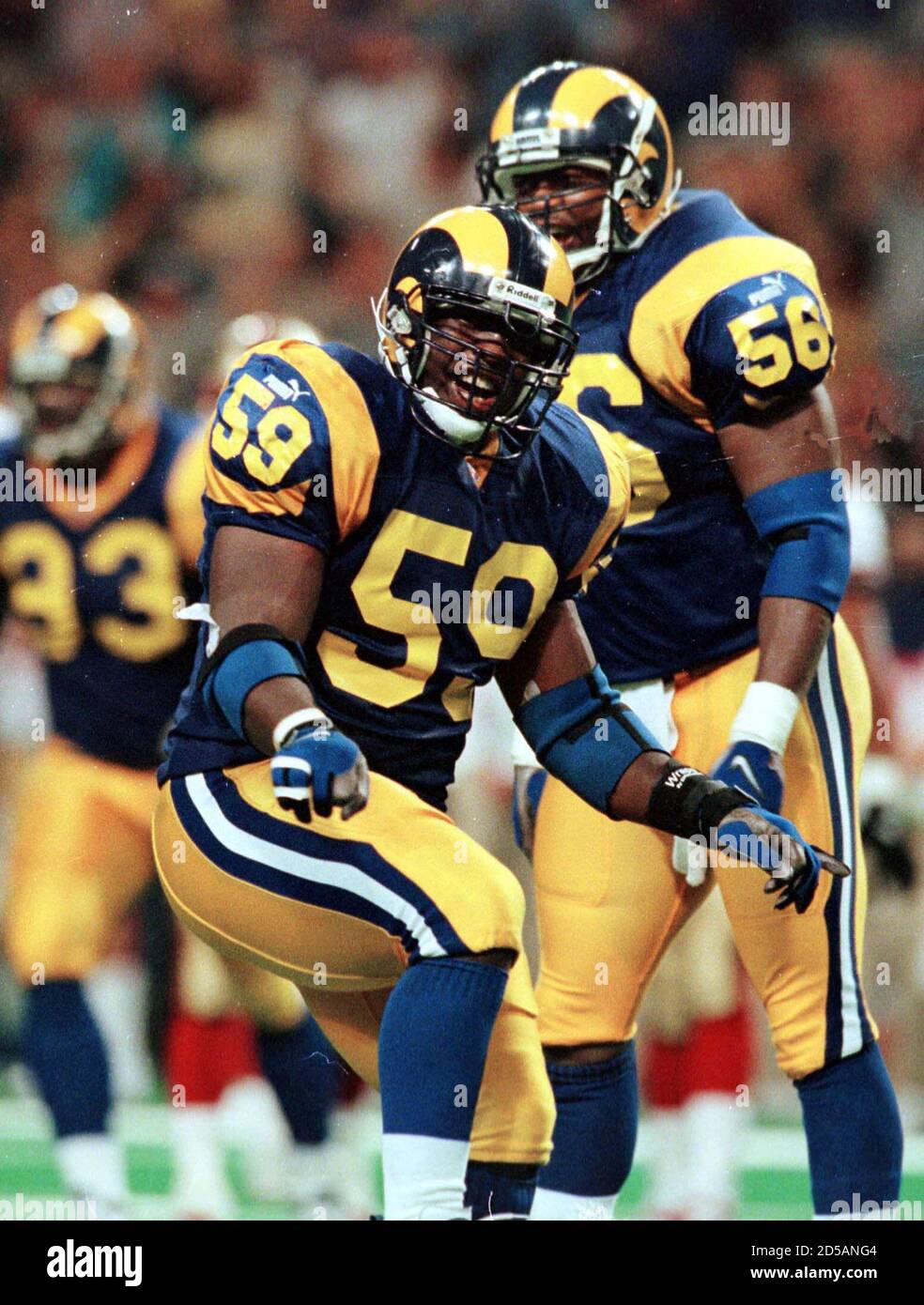 st-louis-rams-london-fletcher-59-and-mike-morton-58-celebrate-stopping-a-san-francisco-49ers-drive-in-the-first-quarter-at-the-twa-dome-in-st-louis-october-10-tpsv-2D5ANG4.jpg