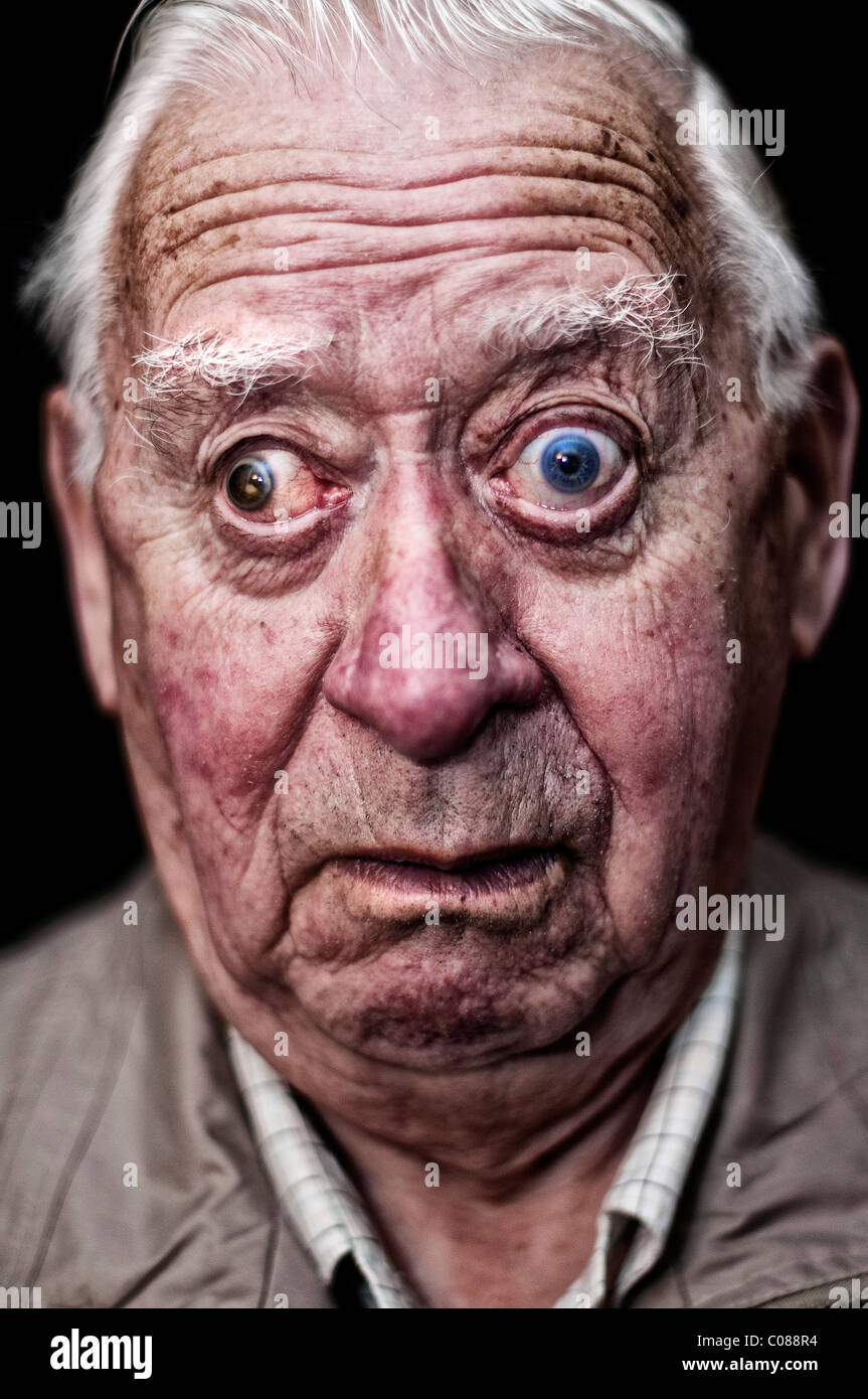 portrait-of-an-old-man-pulling-a-face-C088R4.jpg