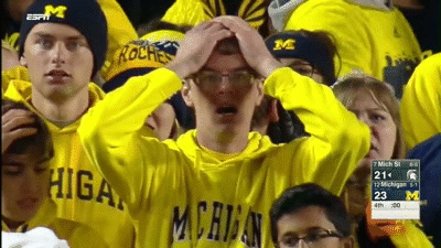 Michigan-Fan-Reacts-to-Botch-Punt-vs-Michigan-State-2015.gif