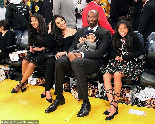 23993564-7939413-Kobe_Bryant_s_grieving_wife_Vanessa_second_from_left_is_trying_h-a-2_1580242102865.jpg