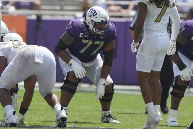 TCU offensive lineman Brandon Coleman (77) lines up during the second half of an NCAA college football game against Colorado Saturday, Sept. 2, 2023, in Fort Worth, Texas. (AP Photo/LM Otero)