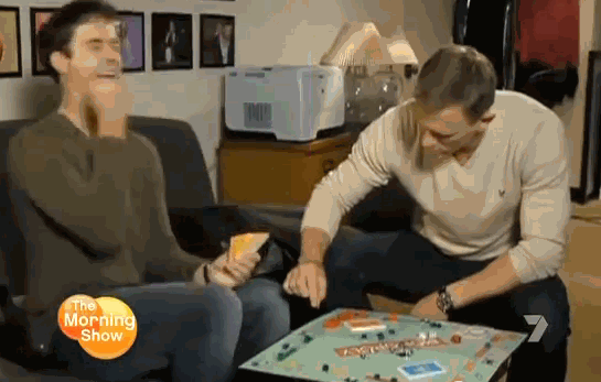 Daniel-Craig-Knocking-Over-Monopoly-Board-SNL.gif