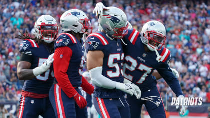 Patriots defense celebrates after making a play.
