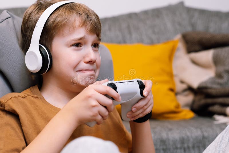sad-teen-boy-upset-losing-video-game-gamer-joystick-his-hands-plays-console-240557389.jpg