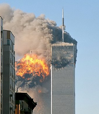 340px-North_face_south_tower_after_plane_strike_9-11.jpg